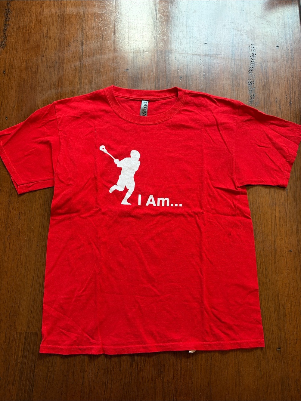 Oura Bright Red Crewneck Tee with white midfielder lacrosse Logo.